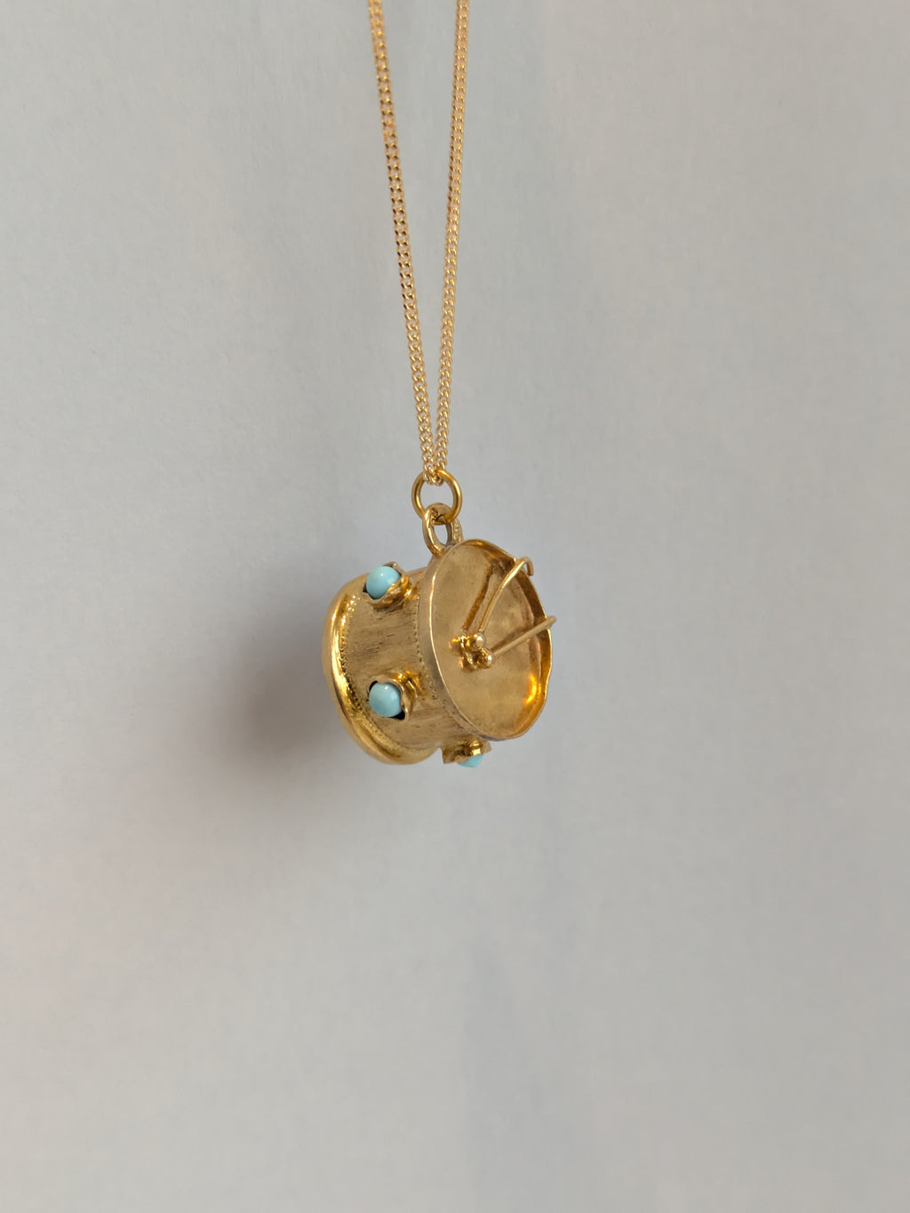 Turquoise Drummer Pendant