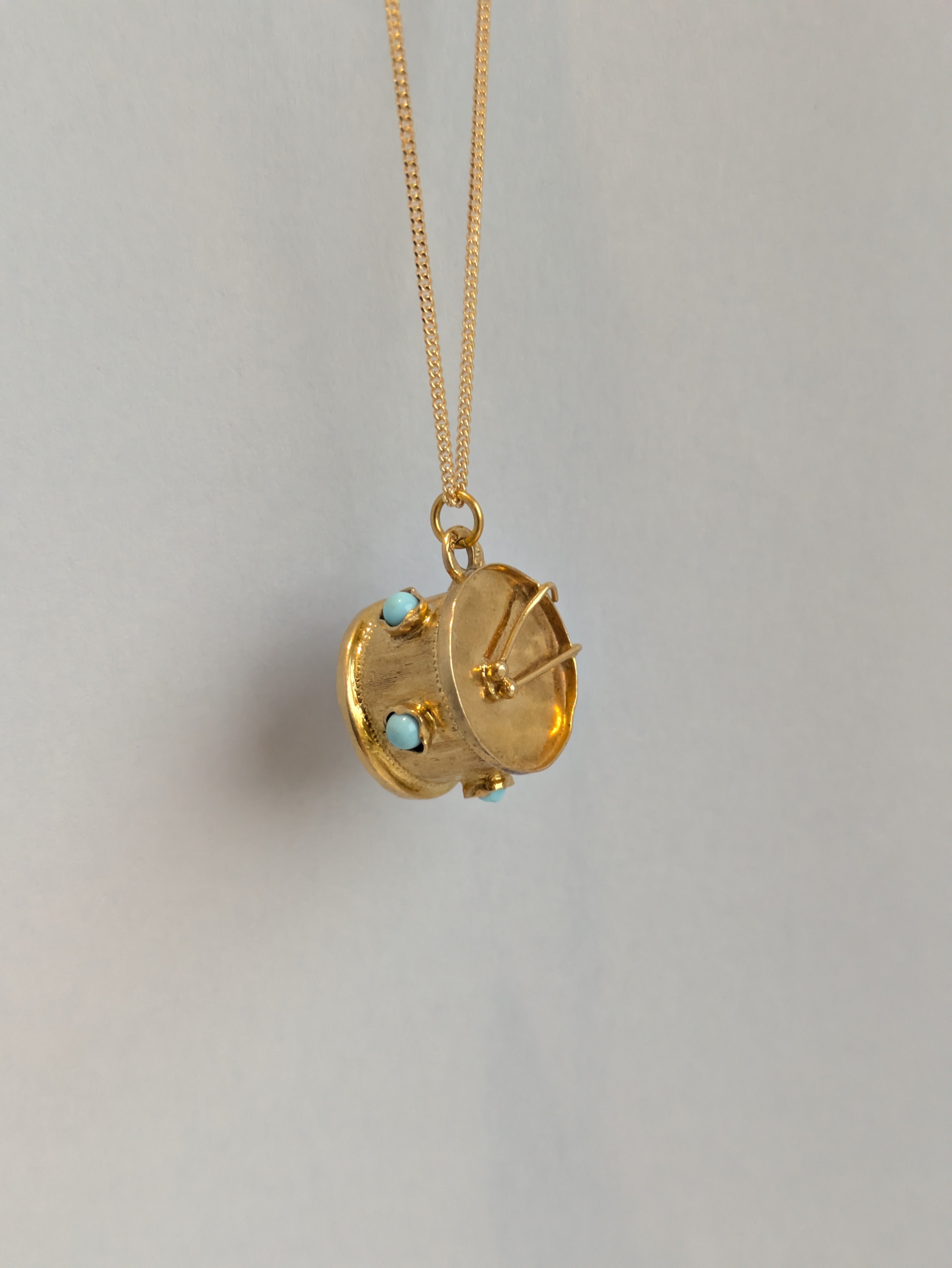 Turquoise Drummer Pendant