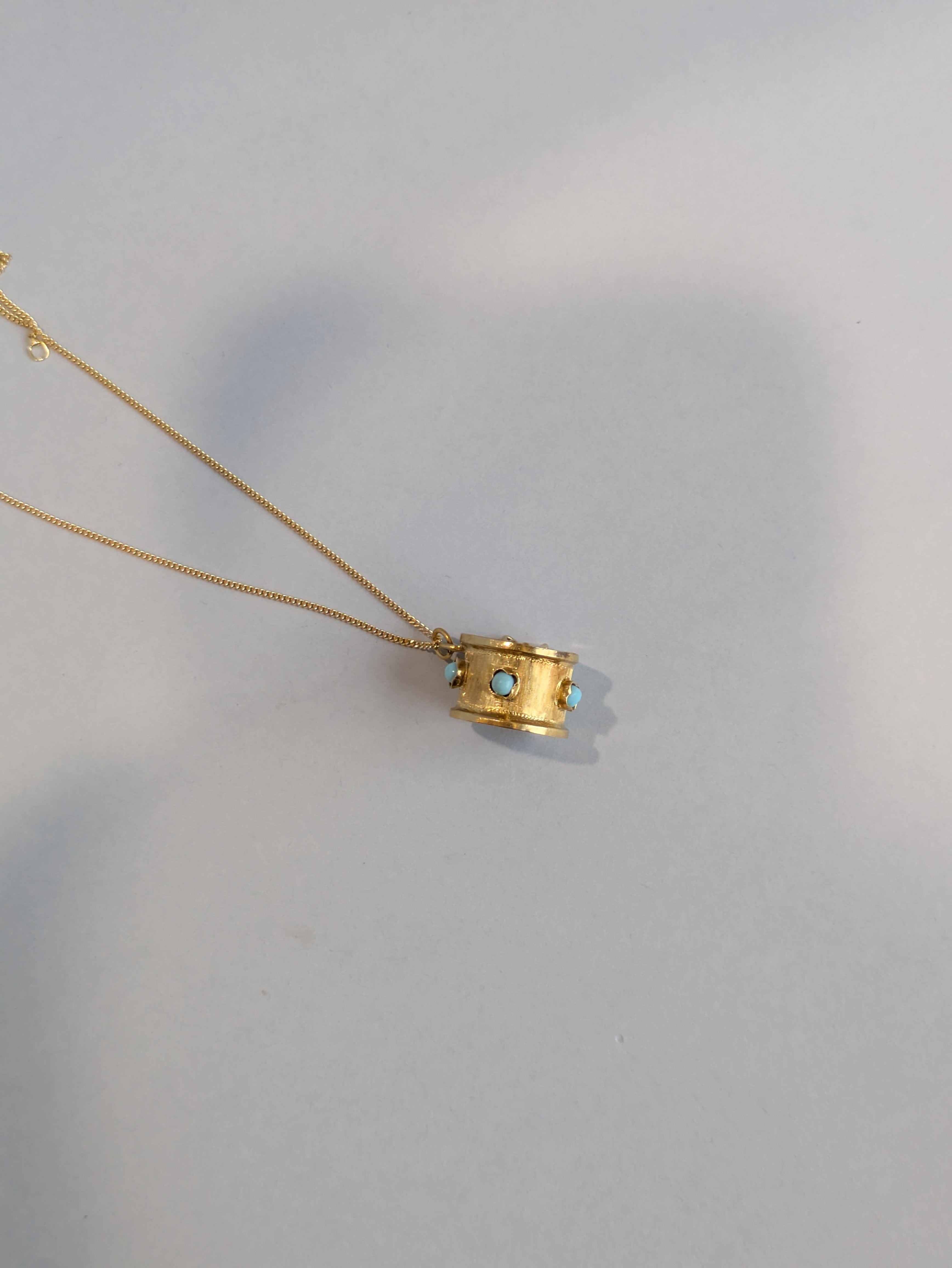 Turquoise Drummer Pendant