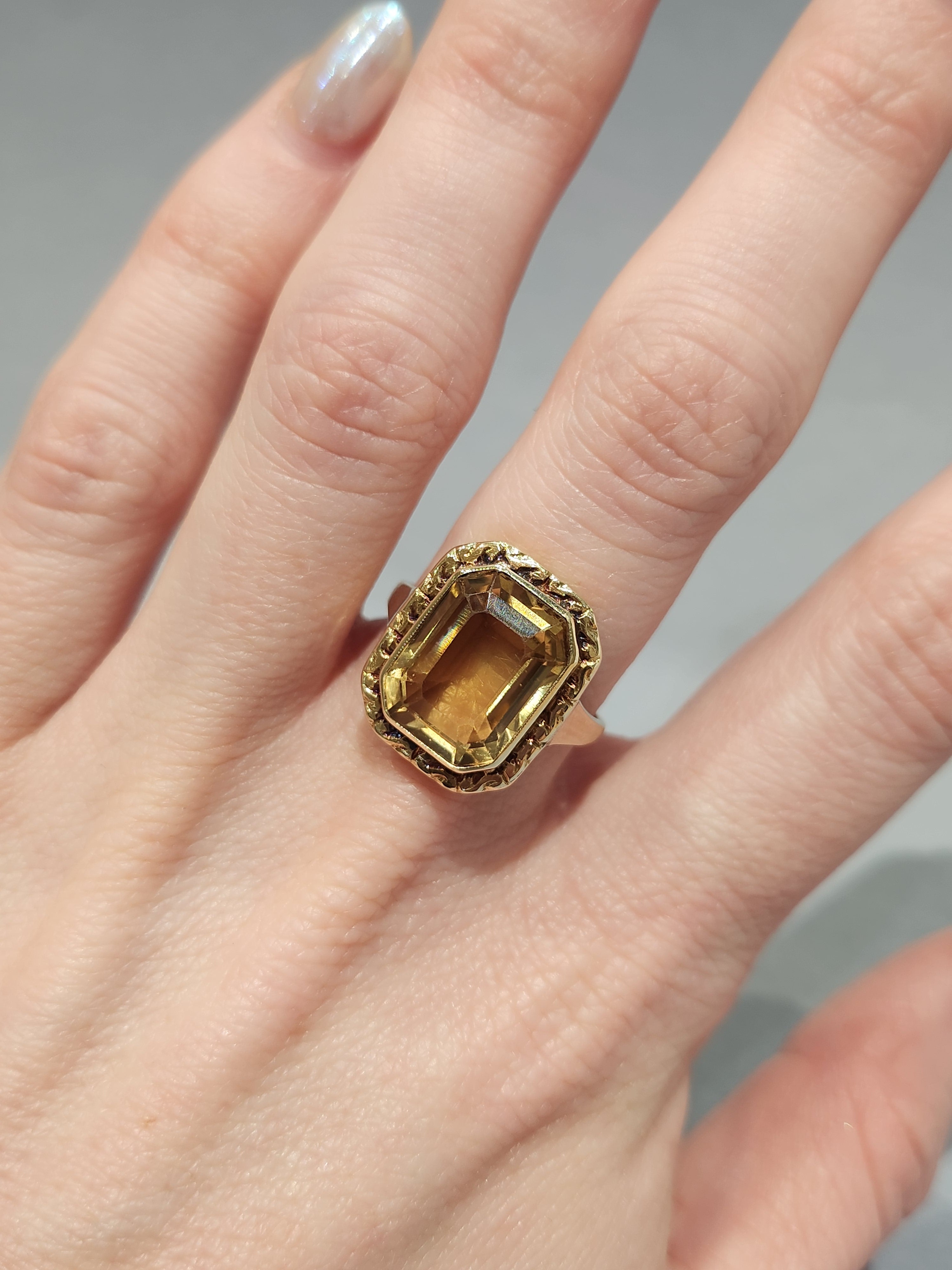Yellow citrine emerald cut ring bezel set