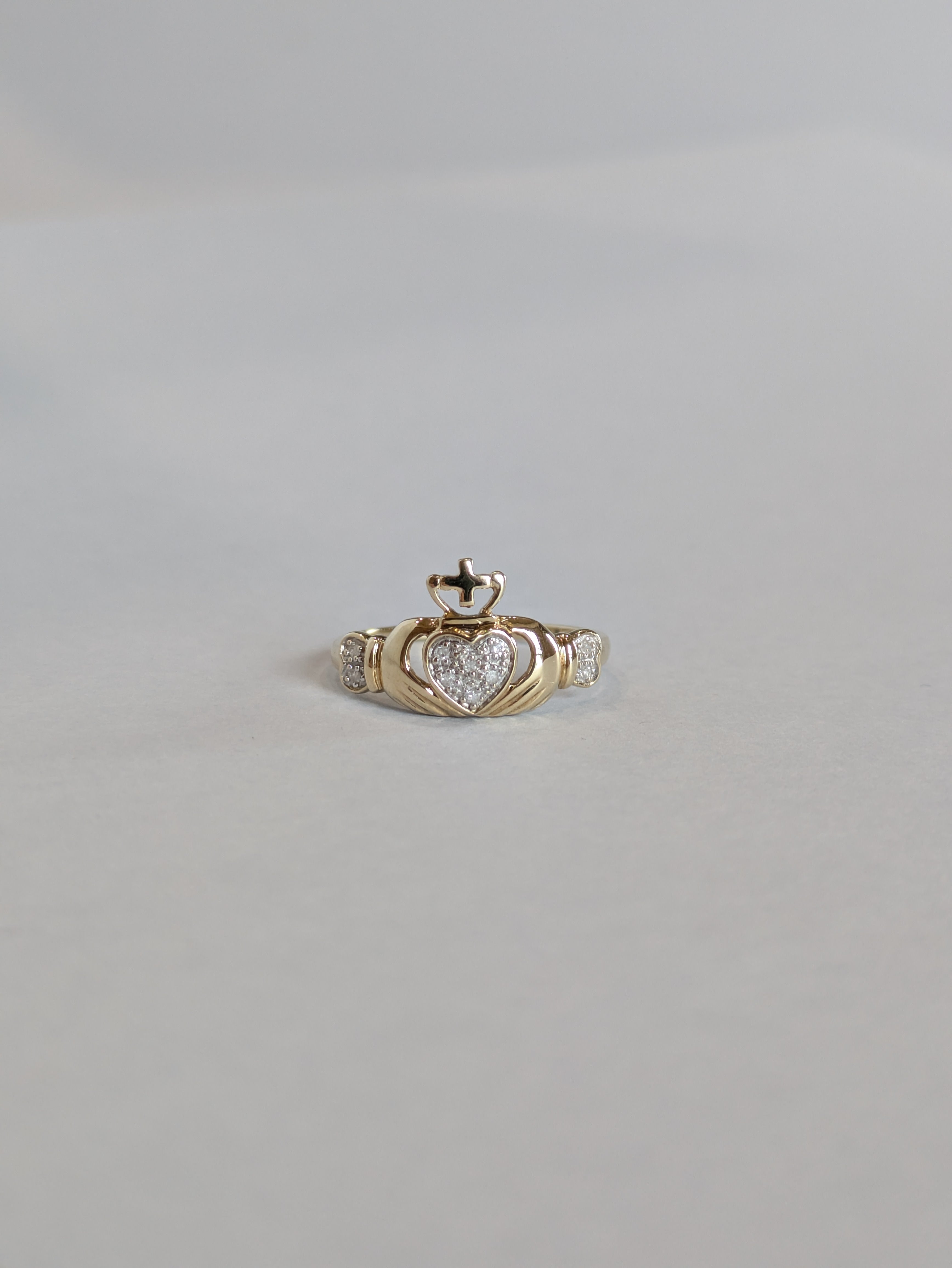 Vintage yellow gold and diamond claddagh ring