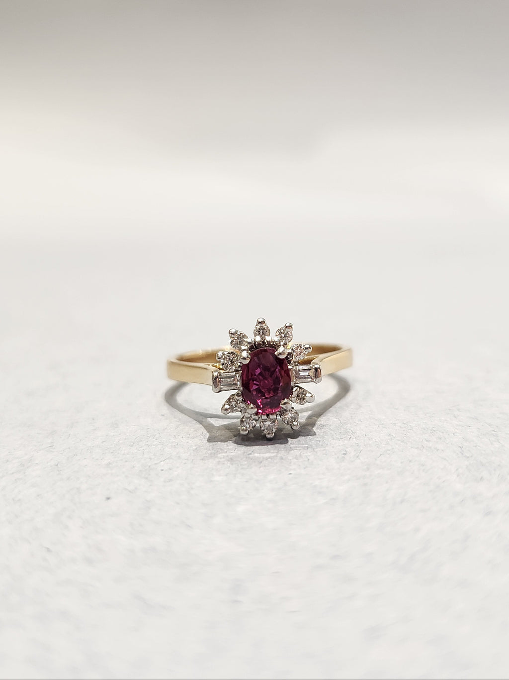 Ruby and Diamond Cluster Ring with Diamond Baguettes front view. 