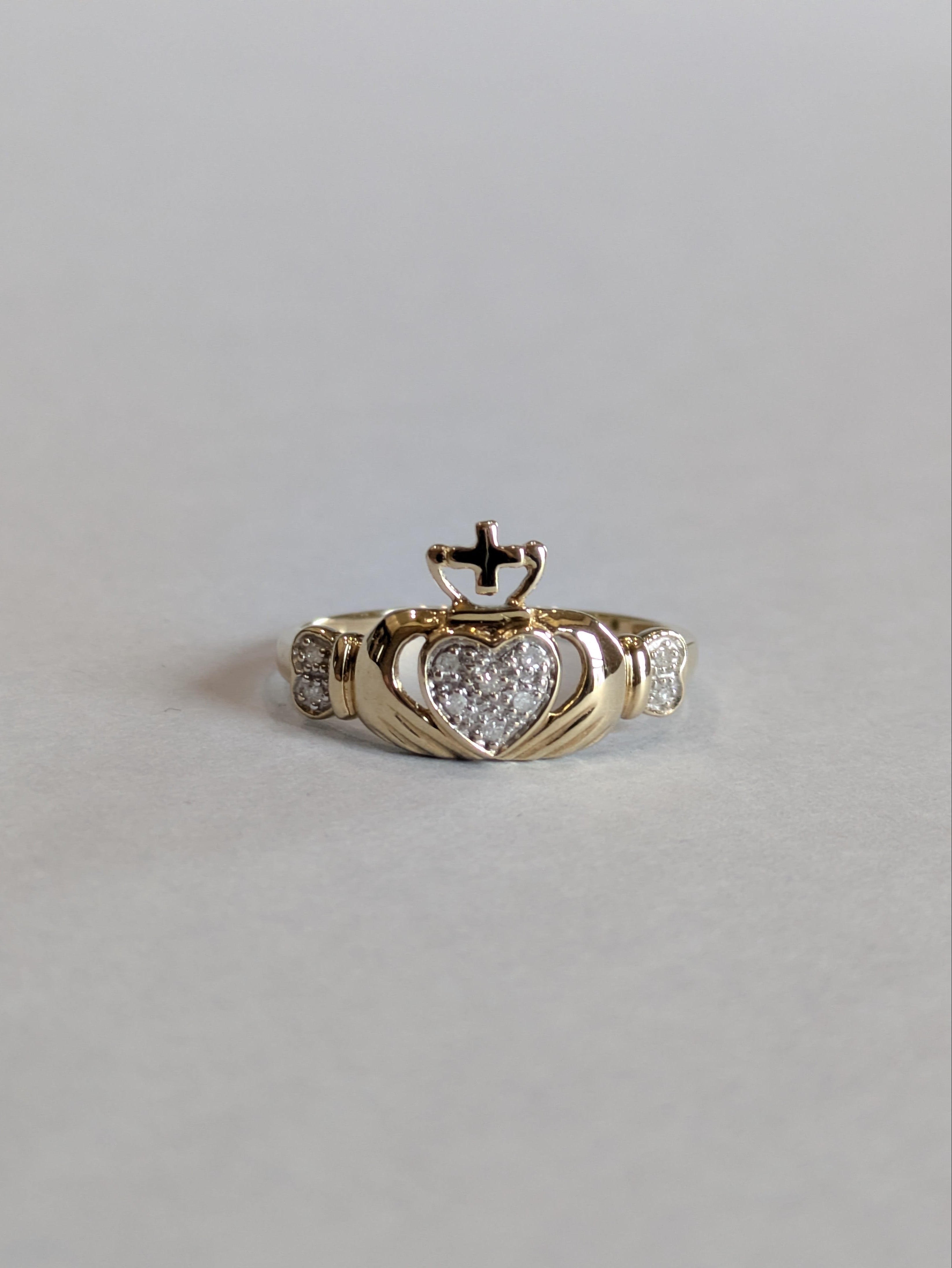 Gold and diamond vintage claddagh ring