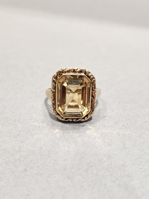 9ct Yellow Gold Ring with Emerald Cut with gold etching border front view shot